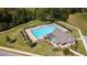 Aerial view of community pool and clubhouse nestled in lush landscaping at 238 Dorothy Ln, Lawrenceville, GA 30046