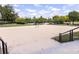 Sand volleyball court for recreational use with surrounding landscaping at 238 Dorothy Ln, Lawrenceville, GA 30046