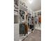 Walk-in closet featuring custom shelving, drawers, and hanging racks at 238 Dorothy Ln, Lawrenceville, GA 30046