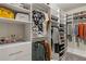 Walk-in closet featuring custom shelving, drawers, and ample storage space at 238 Dorothy Ln, Lawrenceville, GA 30046