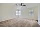 Spacious bedroom with vaulted ceiling and large windows at 2939 Owens Point Nw Trl, Kennesaw, GA 30152