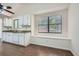 Eat-in kitchen includes a built-in bench under a bright window at 2939 Owens Point Nw Trl, Kennesaw, GA 30152