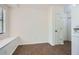 Dining area features a window seat and wood-look tile flooring at 2939 Owens Point Nw Trl, Kennesaw, GA 30152