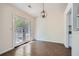 Dining area features glass doors and ample natural light at 2939 Owens Point Nw Trl, Kennesaw, GA 30152