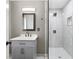 Elegant bathroom featuring a modern vanity, sleek fixtures, and a glass-enclosed shower with stylish tile work at 315 Mossy Pointe, Duluth, GA 30097