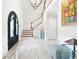 Grand foyer with marble floors, staircase, and elegant design at 315 Mossy Pointe, Duluth, GA 30097