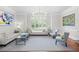 Elegant living room with neutral colors, hardwood floors, and decorative touches at 315 Mossy Pointe, Duluth, GA 30097