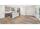 Modern kitchen with stainless steel appliances, island, quartz countertops and gray cabinets at 4785 Marjorie Dr, Cumming, GA 30041