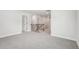 Bonus room with staircase, soft carpet, and neutral walls at 4830 Marjorie Dr, Cumming, GA 30041
