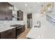 Gourmet kitchen with stainless steel appliances, island with seating, and pendant lighting at 4830 Marjorie Dr, Cumming, GA 30041