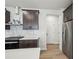 Kitchen featuring white and gray backsplash and stainless steel appliances at 4830 Marjorie Dr, Cumming, GA 30041