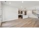 Open-concept living area seamlessly connects to the kitchen, offering ample space at 4830 Marjorie Dr, Cumming, GA 30041