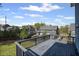 Spacious wooden deck overlooking a flat grassy yard, perfect for outdoor entertaining at 5153 Elkins Ln, Acworth, GA 30101