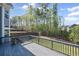 Relaxing view of the backyard from the deck, showcasing the landscape and surrounding greenery at 5153 Elkins Ln, Acworth, GA 30101