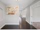 Inviting entryway boasting hardwood floors, neutral paint, and decorative accents enhancing the home's appeal at 5153 Elkins Ln, Acworth, GA 30101
