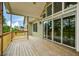 Large wooden deck features multiple sliding glass doors, creating an inviting indoor-outdoor flow at 773 Pebblebrook Rd, Mableton, GA 30126