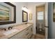 Bathroom with double sink vanity and granite countertops at 773 Pebblebrook Rd, Mableton, GA 30126
