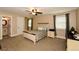 Spacious bedroom featuring a ceiling fan and neutral tones, promoting a cozy atmosphere at 773 Pebblebrook Rd, Mableton, GA 30126