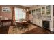 Dining room with hardwood floors, wine cooler and glass cabinets at 773 Pebblebrook Rd, Mableton, GA 30126