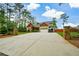 Lovely single-story home with long driveway and beautiful landscaping at 773 Pebblebrook Rd, Mableton, GA 30126