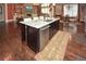 Kitchen island with stainless steel dishwasher and granite countertops at 773 Pebblebrook Rd, Mableton, GA 30126