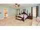 Large main bedroom with king bed, sitting area and ensuite bathroom at 773 Pebblebrook Rd, Mableton, GA 30126