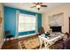 Well-organized office with an area rug, desk, and decor for a professional work environment at 773 Pebblebrook Rd, Mableton, GA 30126