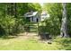 Pastoral property featuring a charming barn, fenced pasture, and mature trees, blending rustic charm and serene landscapes at 88 Cline Smith Ne Rd, Cartersville, GA 30121