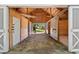 Inside view of barn including stalls at 88 Cline Smith Ne Rd, Cartersville, GA 30121