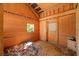 Barn stall featuring wood interior and small window at 88 Cline Smith Ne Rd, Cartersville, GA 30121