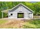 Well-maintained barn featuring sliding doors, exterior lighting, and ample space at 88 Cline Smith Ne Rd, Cartersville, GA 30121
