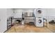 Laundry room with pet-washing area with washer and dryer, storage, and grooming station at 88 Cline Smith Ne Rd, Cartersville, GA 30121