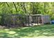 Backyard chicken coop in green yard shows great potential for sustainable living and hobby farming at 88 Cline Smith Ne Rd, Cartersville, GA 30121