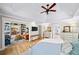Inviting main bedroom with attached sitting room, featuring tray ceiling and plenty of natural light at 88 Cline Smith Ne Rd, Cartersville, GA 30121