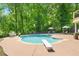 Beautiful backyard featuring a sparkling pool and a large patio area, ideal for entertaining at 88 Cline Smith Ne Rd, Cartersville, GA 30121