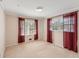 Bedroom with plush carpeting, large windows and natural light at 1788 Hammond Woods Sw Cir, Marietta, GA 30008