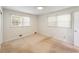 Bedroom with two windows and carpeting at 1788 Hammond Woods Sw Cir, Marietta, GA 30008