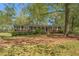 Traditional brick home with well-maintained front yard; mature shade trees at 1788 Hammond Woods Sw Cir, Marietta, GA 30008