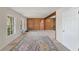 Open living room featuring carpet, a decorative rug, and ample natural light through large windows at 1788 Hammond Woods Sw Cir, Marietta, GA 30008