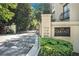 Elegant gated entrance to The Carlyle on Peachtree, with manicured landscaping at 2769 Peachtree Ne Rd # 6, Atlanta, GA 30305