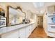 Kitchen counter and cabinets, including a large, decorative wall mirror at 2769 Peachtree Ne Rd # 6, Atlanta, GA 30305
