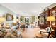 Elegant living room with a comfortable seating arrangement and views of outdoor greenery at 2769 Peachtree Ne Rd # 6, Atlanta, GA 30305