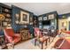 Cozy sitting room with a fireplace, built-in bookshelves, and refined decor at 2769 Peachtree Ne Rd # 6, Atlanta, GA 30305