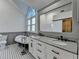 Bright bathroom with separate shower, double vanity and vintage soaking tub at 4640 Lambton Cir, Suwanee, GA 30024