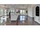 Spacious and bright living room with eat-in kitchen, hardwood floors and built ins at 4640 Lambton Cir, Suwanee, GA 30024