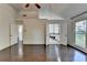 Spacious main bedroom with hardwood floors, many windows and ensuite bath at 4640 Lambton Cir, Suwanee, GA 30024