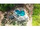 Aerial view of pool and jacuzzi with outdoor patio and landscaping at 925 Upper Hembree Rd, Roswell, GA 30076
