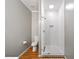 Bathroom features a stand up shower with white subway tile and river rock floor at 925 Upper Hembree Rd, Roswell, GA 30076