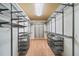 Walk-in closet with adjustable shelving and ample storage space at 925 Upper Hembree Rd, Roswell, GA 30076