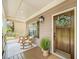 Cozy porch with rocking chairs, perfect for enjoying a peaceful morning or evening at 925 Upper Hembree Rd, Roswell, GA 30076
